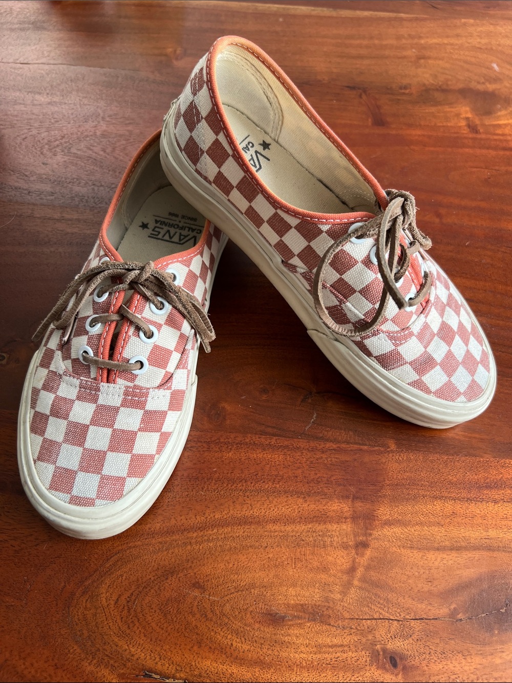 Vans checkered boat shoe sneaker with leather laces and boat soles.
